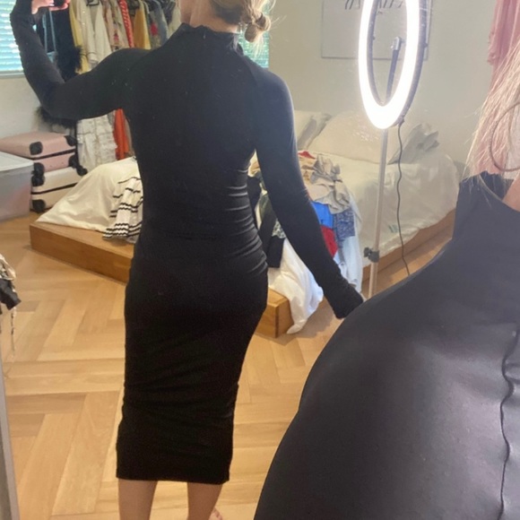 Black Contemporary Turtleneck Dress - Picture 2 of 4